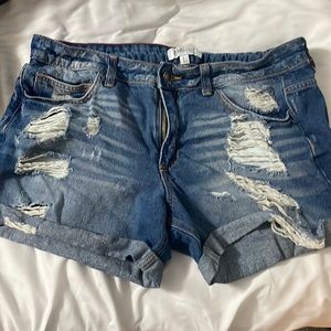 Distressed denim shorts